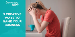 Woman at desk stressed out about how to come up with a business name